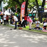 Outdoor petanque event showcasing fopikotamanado.org community spirit and competition.